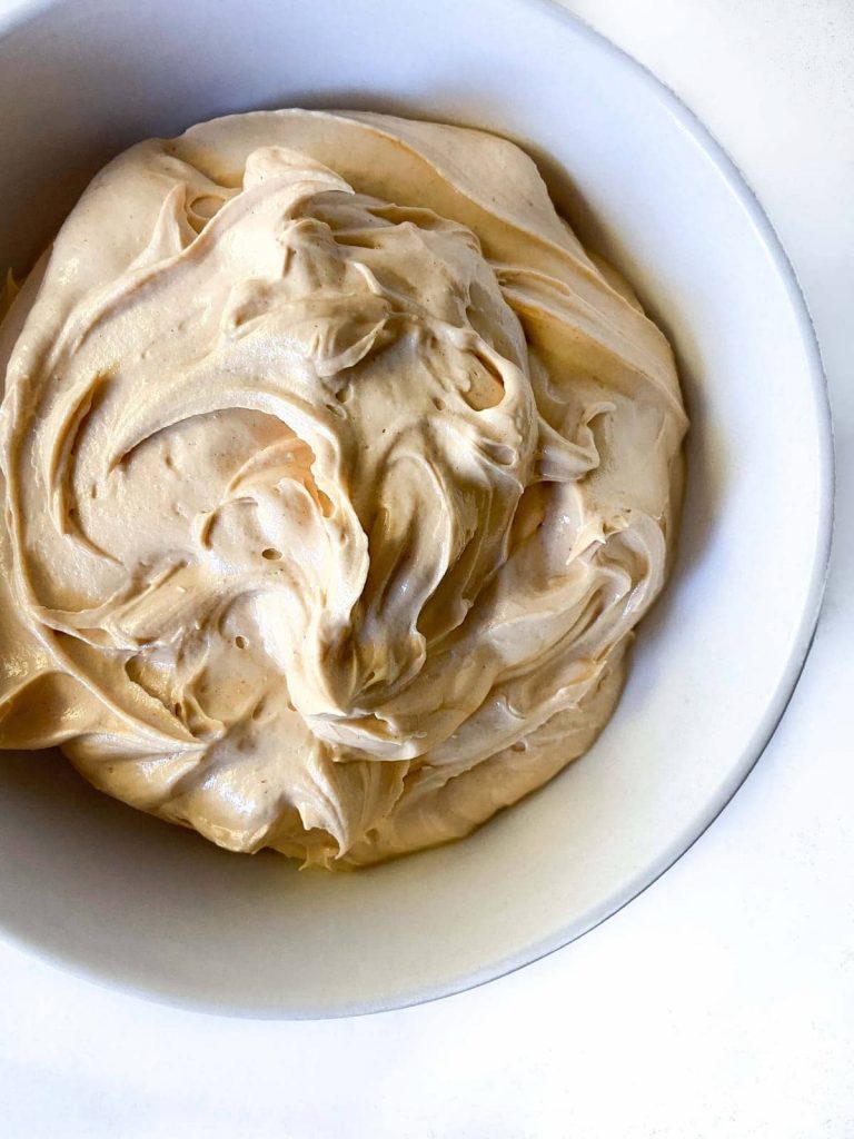 A bowl of peanut butter frosting