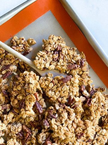 Maple Pecan Granola Clusters on a Baking Sheet