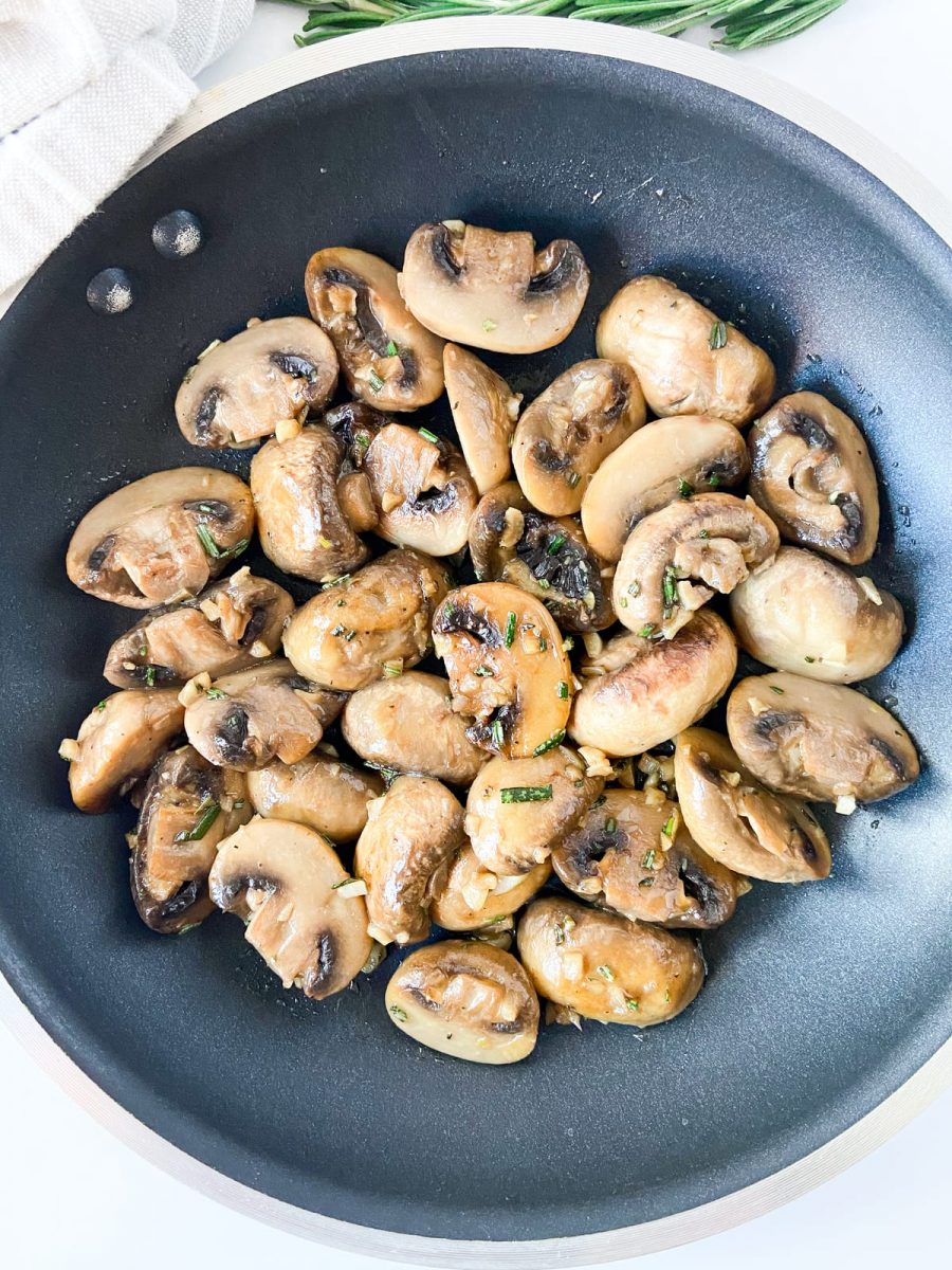 A pan of garlic rosemary mushrooms. 