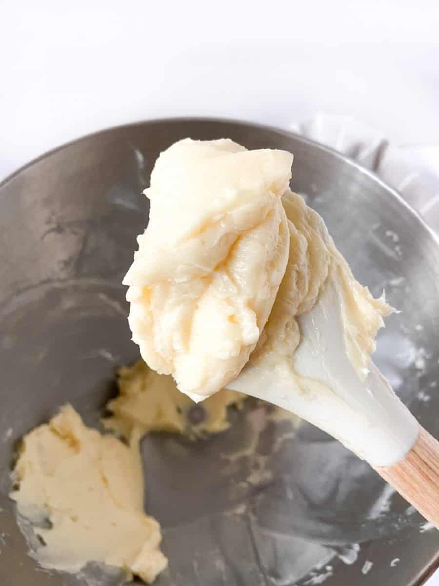 A spatula with honey butter. 