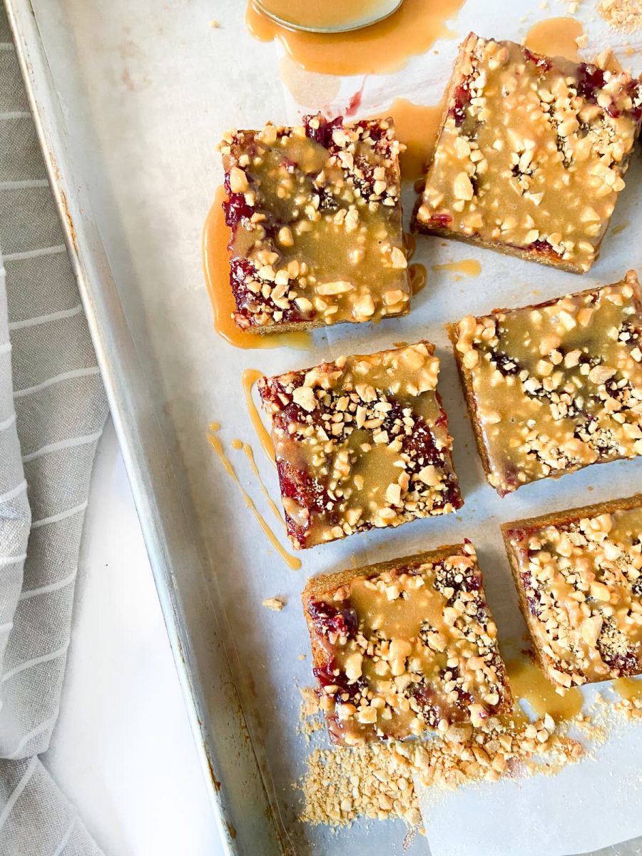 peanut butter and jelly bars on a tray