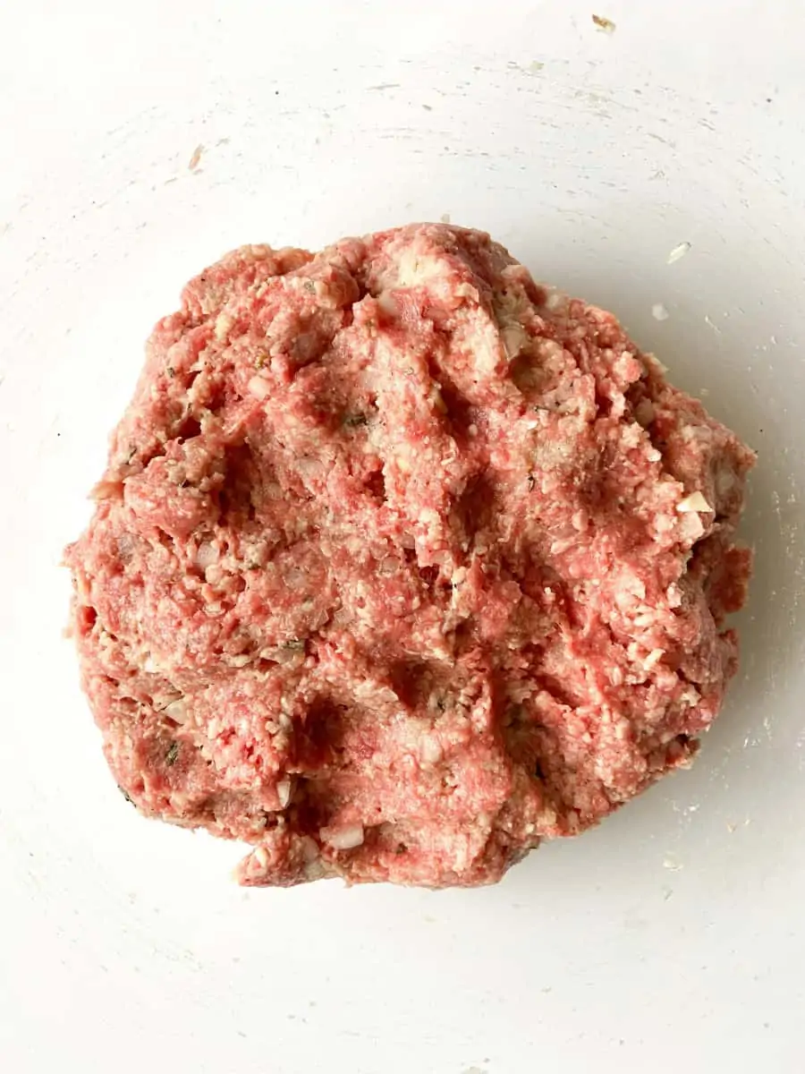The raw beef mixture in a bowl.