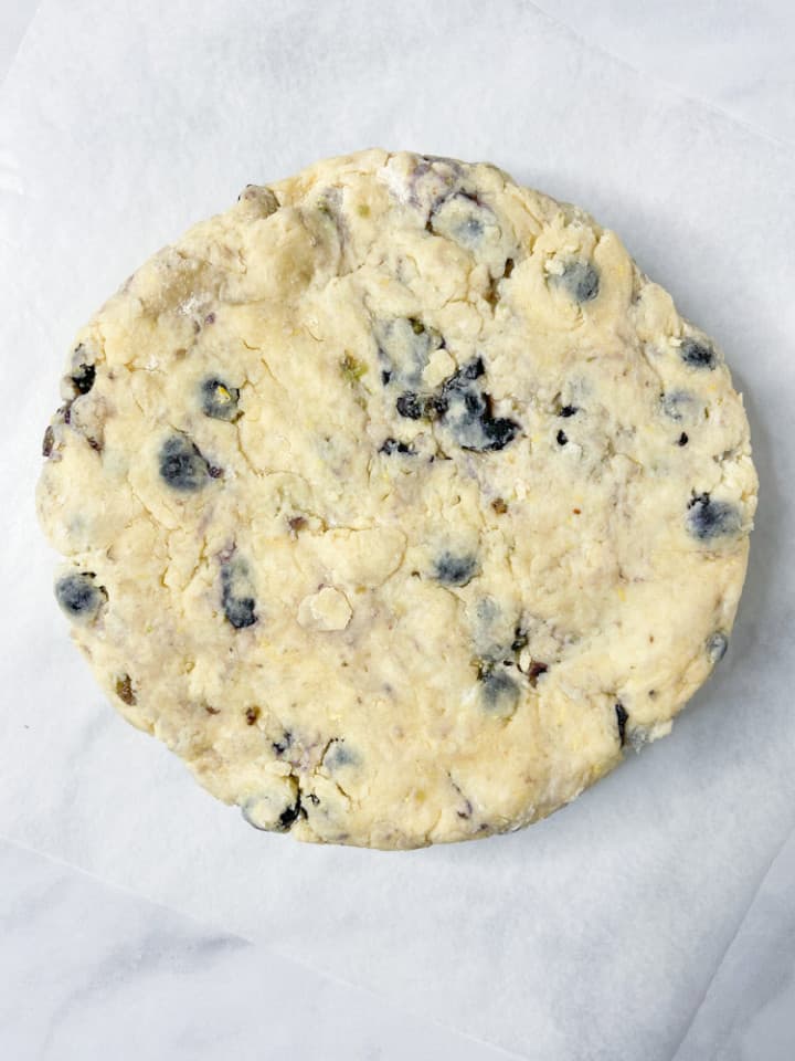 A disk of blueberry scone dough.