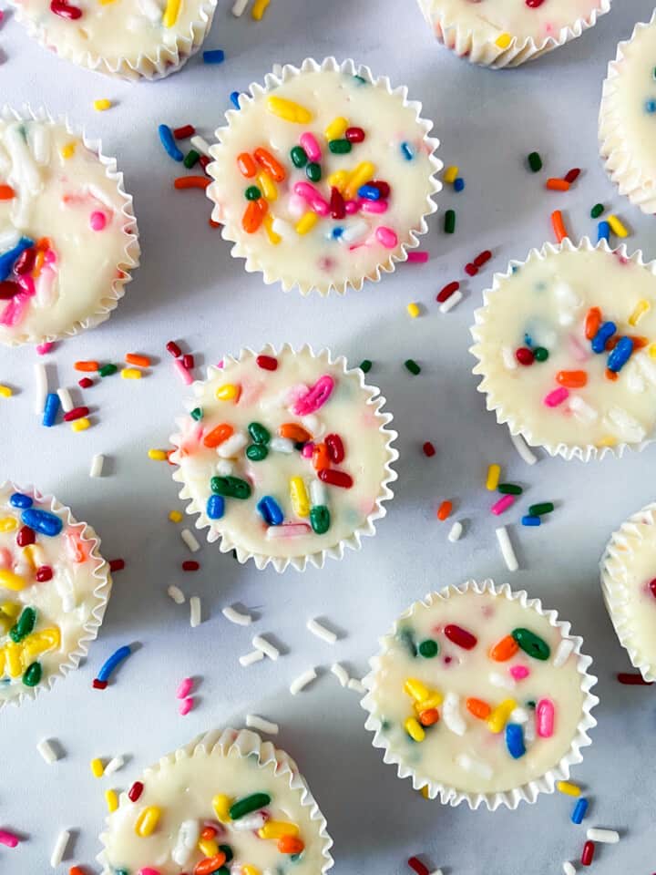 Mini Funfetti Cheesecakes with sprinkles.