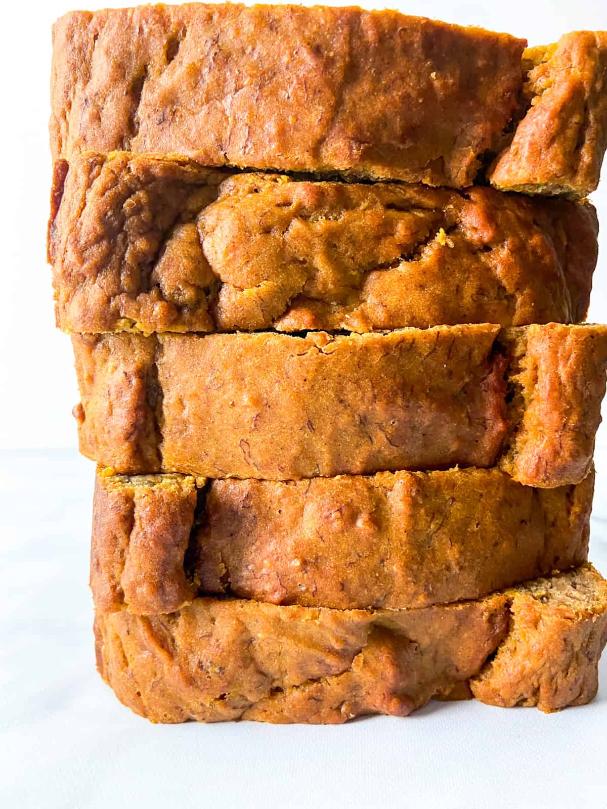 A stack of pumpkin bread slices.