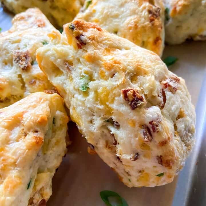 A close-up of a bacon cheddar scone.