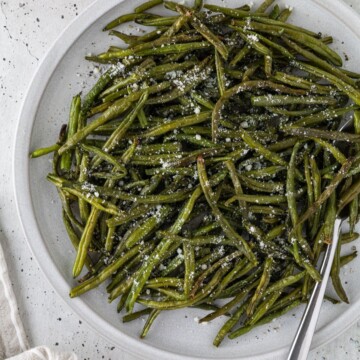 A plate of roasted green beans.