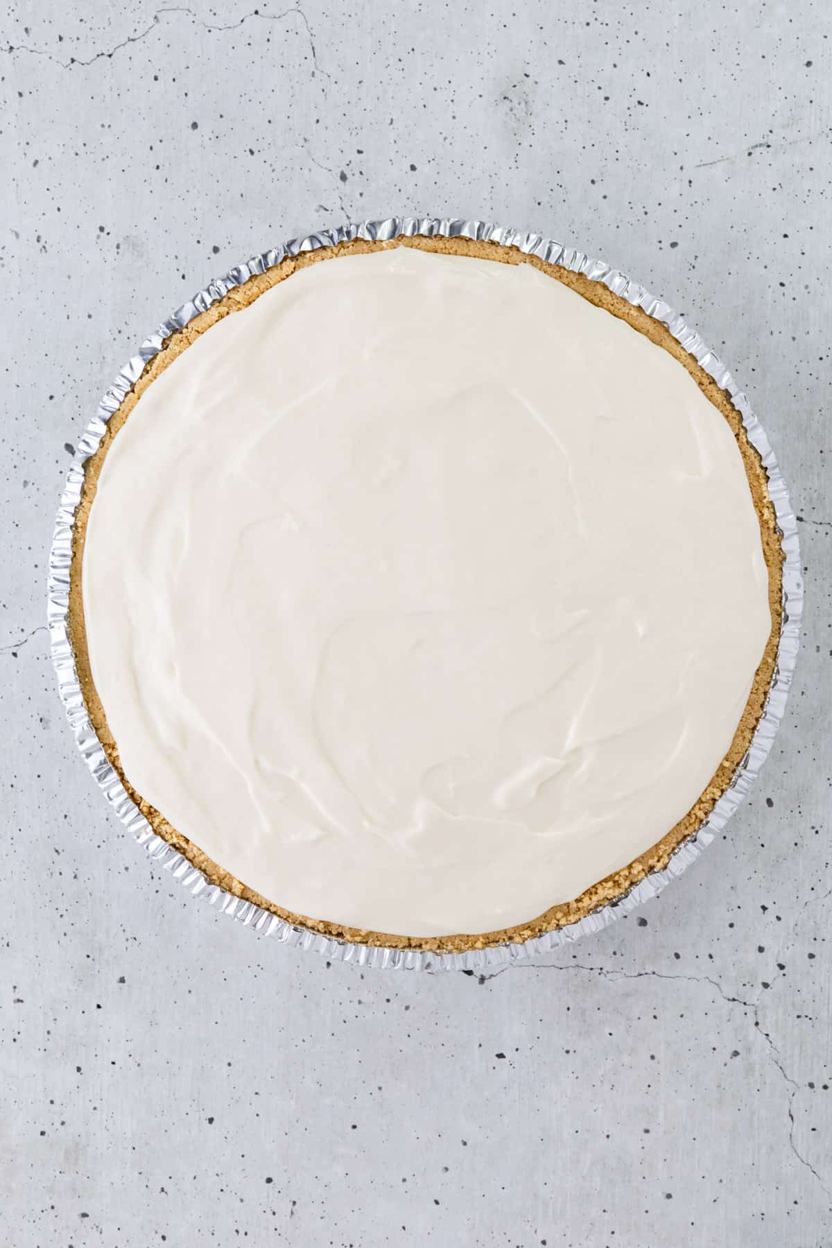 Cheesecake filling in a store-bought graham cracker crust.