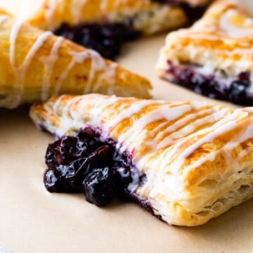 A close-up of a blueberry turnover.